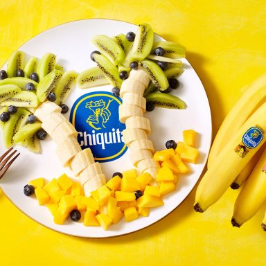 Palmboom van Chiquita banaan, kiwi en mango