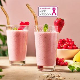 Roze Chiquita-banaan-aalbessenshake